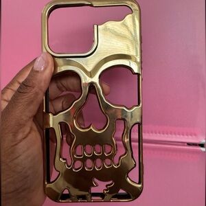 iPhone 15 pro max gold skull case